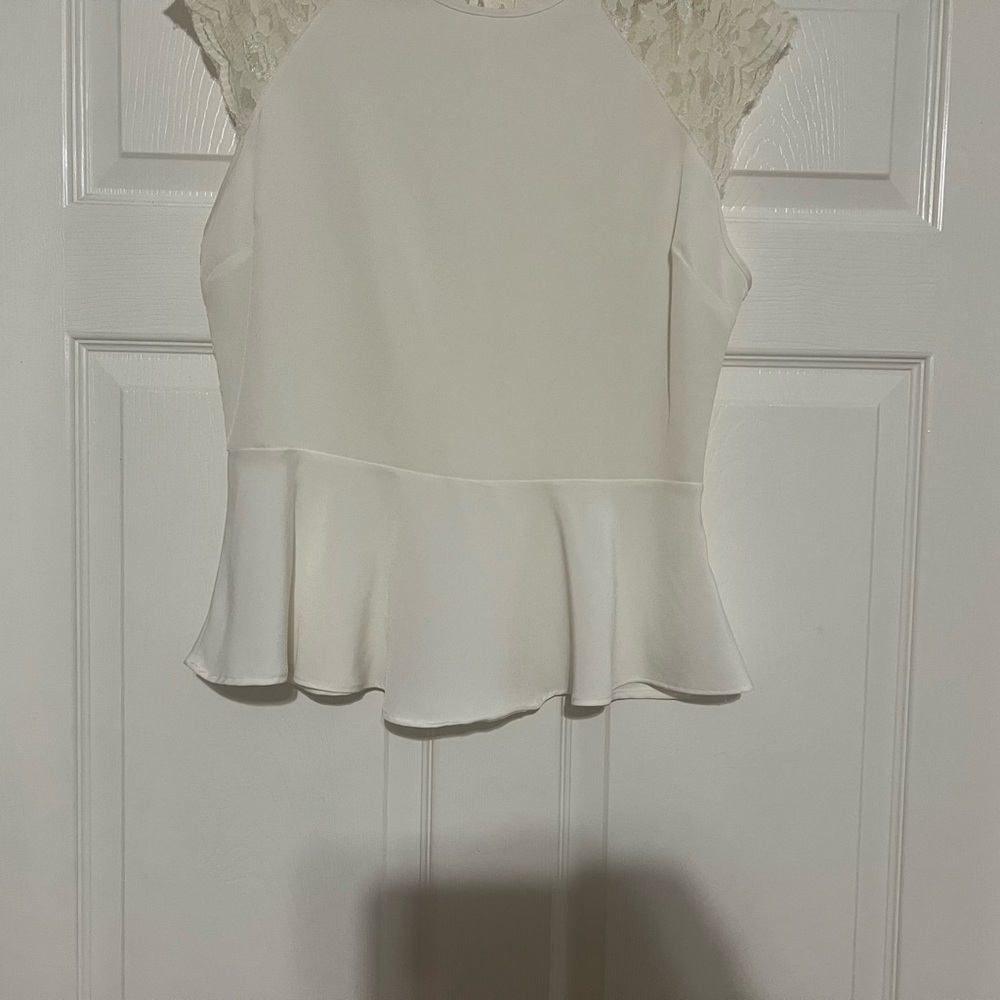 Elegant Cream Peplum Blouse with Blouse-Style Sleeves